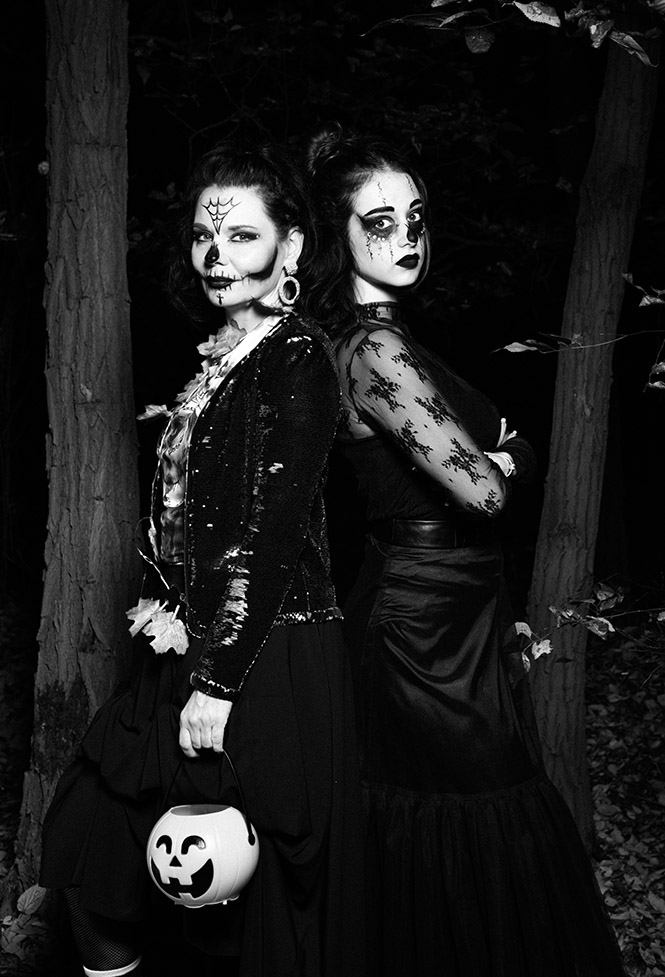 Sminkelt Halloween-portré tökkel